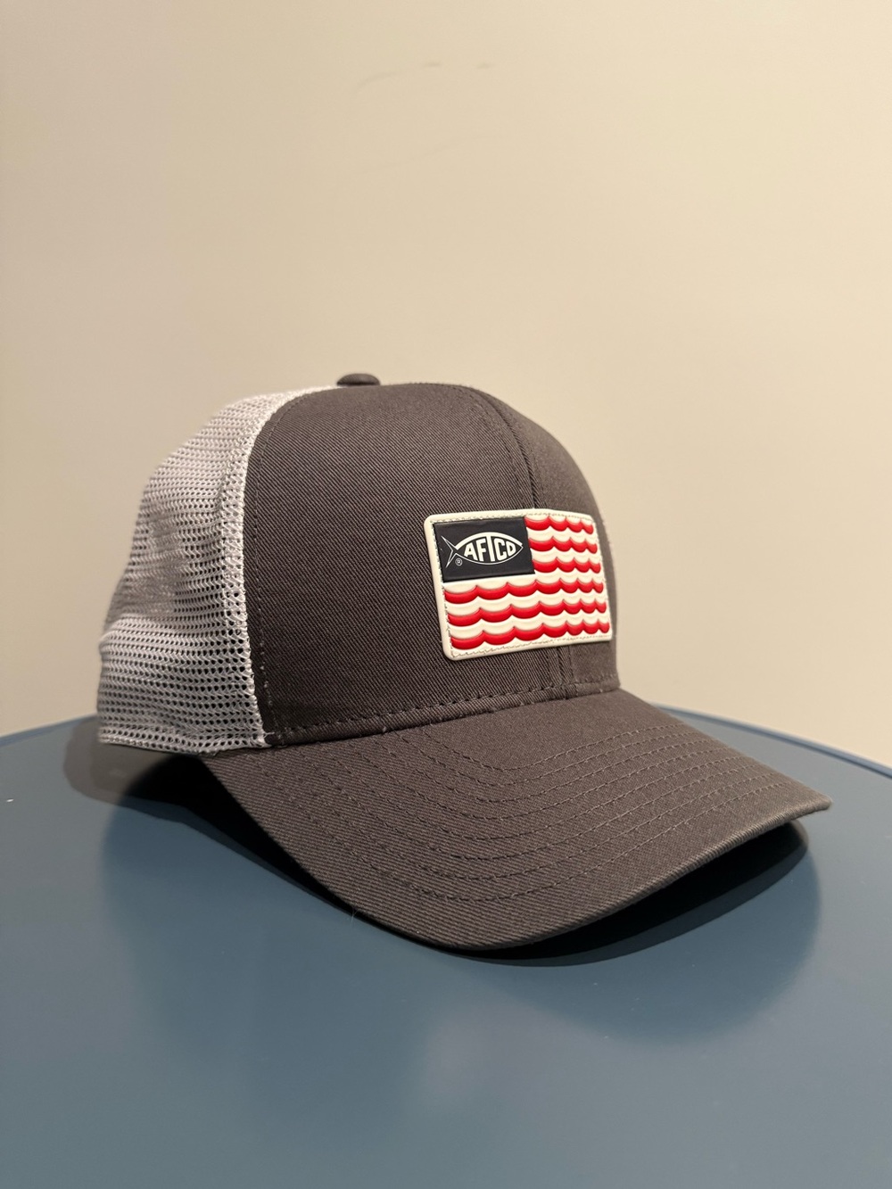 AFTCO Men’s Canton American Flag w/ Fish & Waves Grey One Size Mesh Trucker Hat